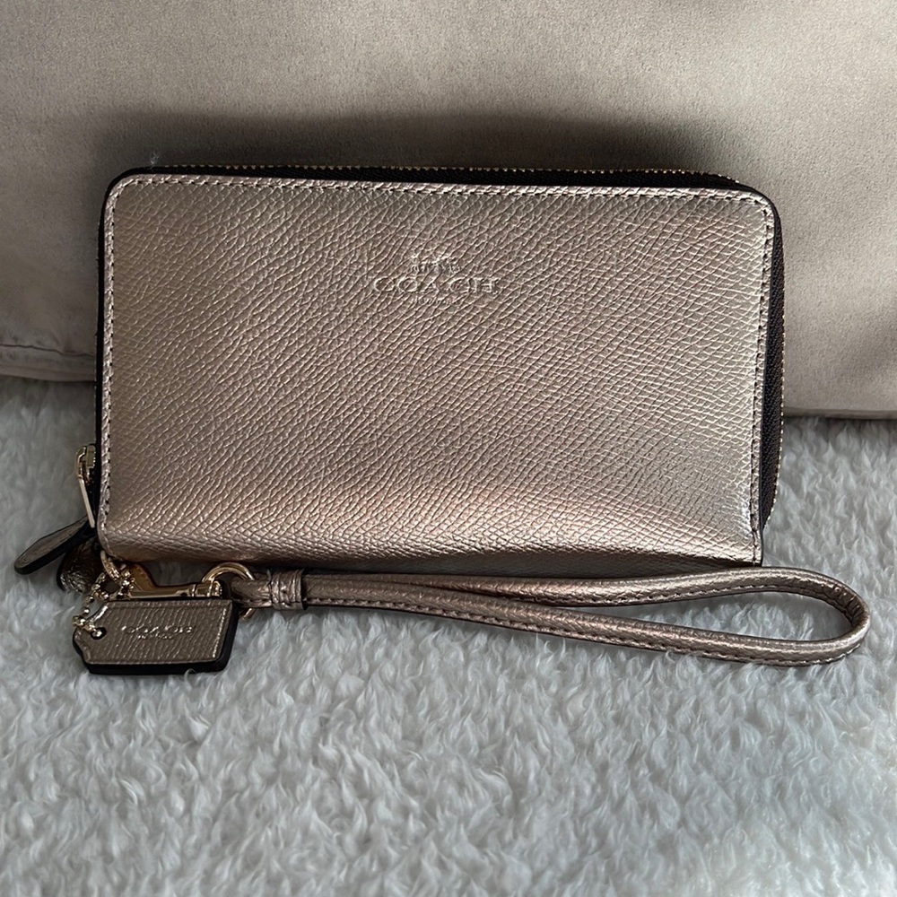 Coach wristlet. Metallic gold. NWOT.